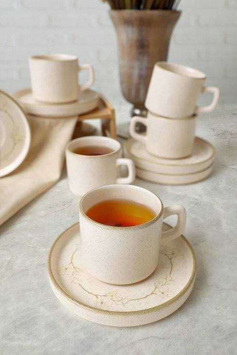 Hermia Juego de tazas de té y platillos de 12 piezas color crema